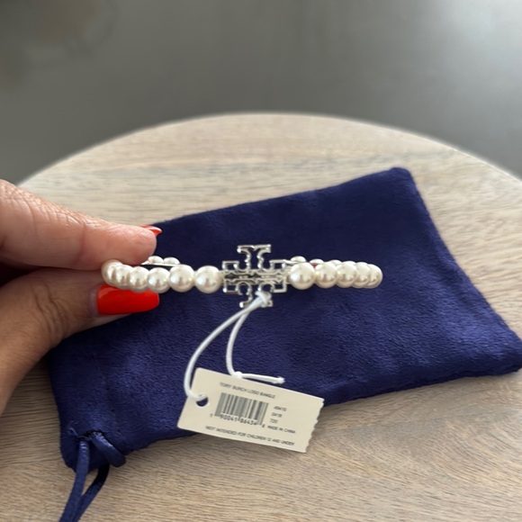 Tory Burch NWT Hinged Elegant Pearl Cuff with Logo Silver Cross w/Dust B… - Picture 2 of 6